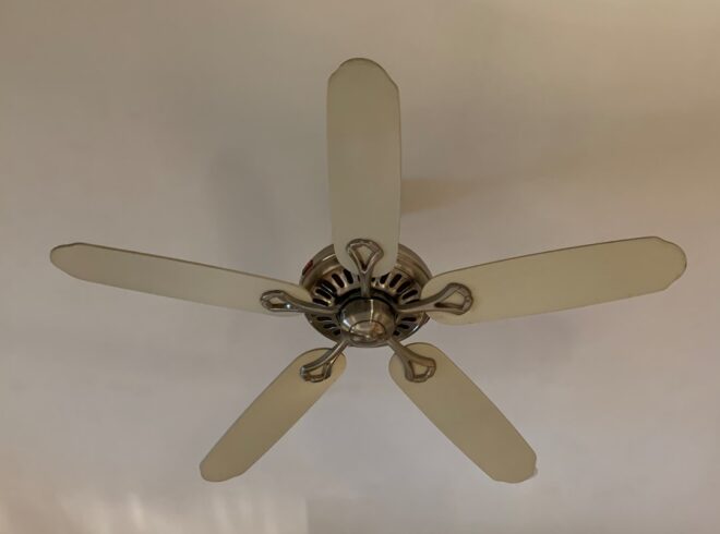 Minka Aire ceiling fan with five blades and light fixtures, featured in a blog post about common fan problems and repair solutions.